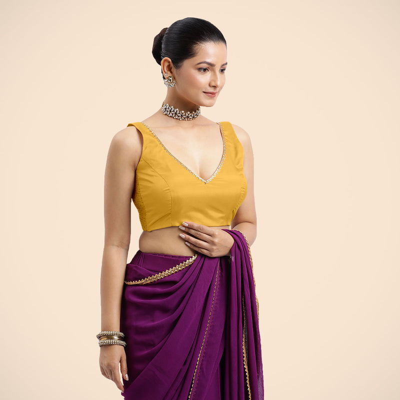 Raisa x Tyohaar | Sleeveless Marigold Yellow FlexiFit™ Gota Embellished Saree Blouse with Curved V-Neck-Binks