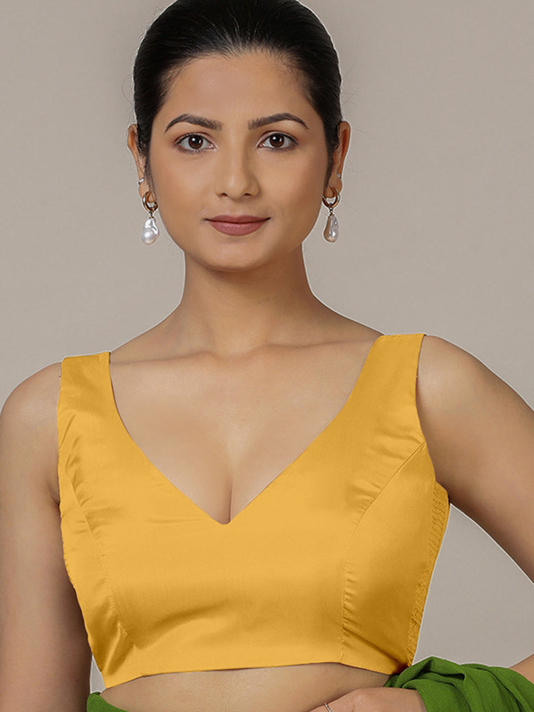 Raisa x Rozaana Saree Blouse, in Yellow Artificial Silk, featuring sleeveless and curved v-neckline.