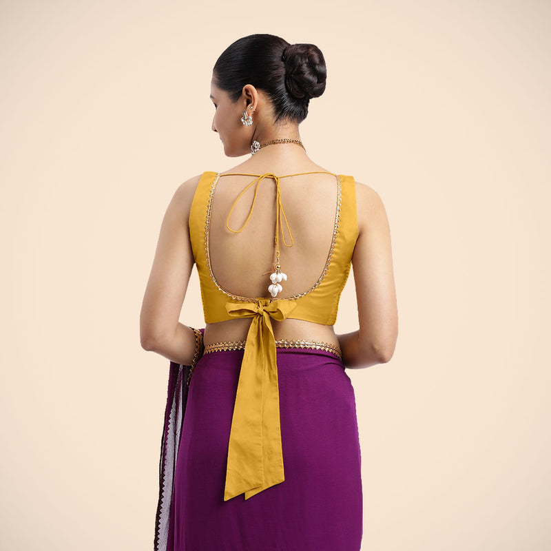 Raisa x Tyohaar | Sleeveless Marigold Yellow FlexiFit™ Gota Embellished Saree Blouse with Curved V-Neck-Binks
