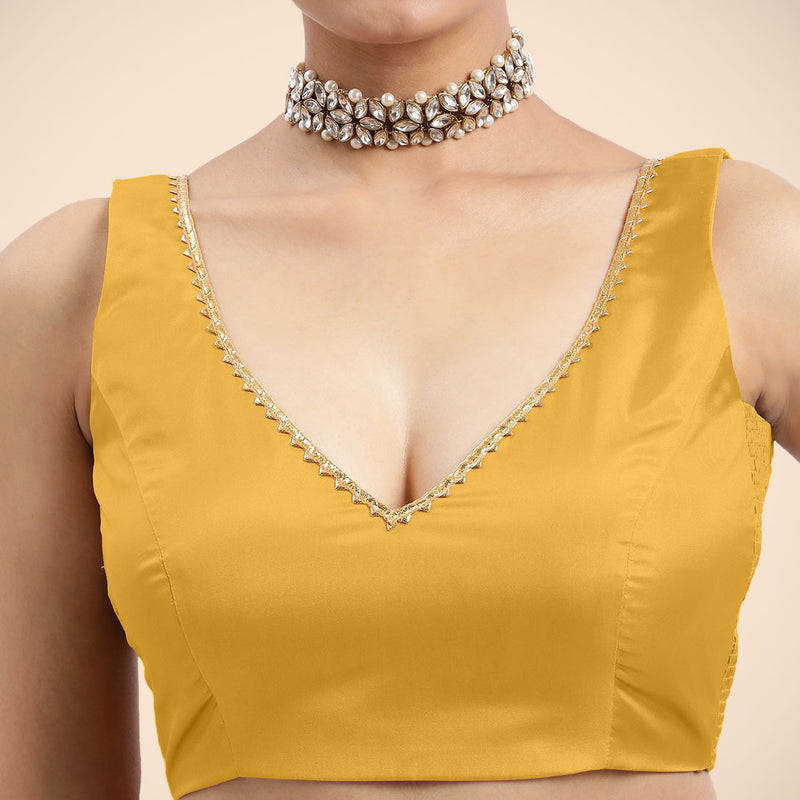 Raisa x Tyohaar | Sleeveless Marigold Yellow FlexiFit™ Gota Embellished Saree Blouse with Curved V-Neck-Binks