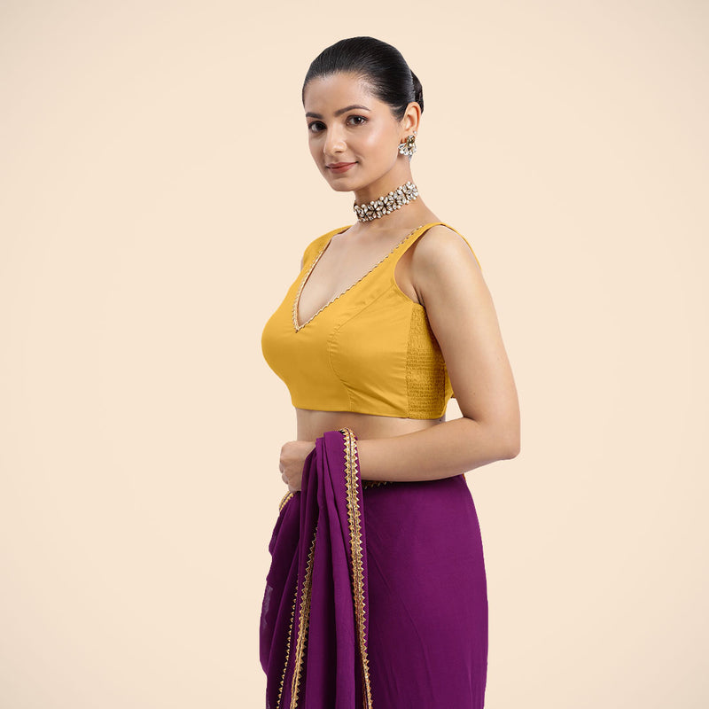 Raisa x Tyohaar | Sleeveless Marigold Yellow FlexiFit™ Gota Embellished Saree Blouse with Curved V-Neck-Binks