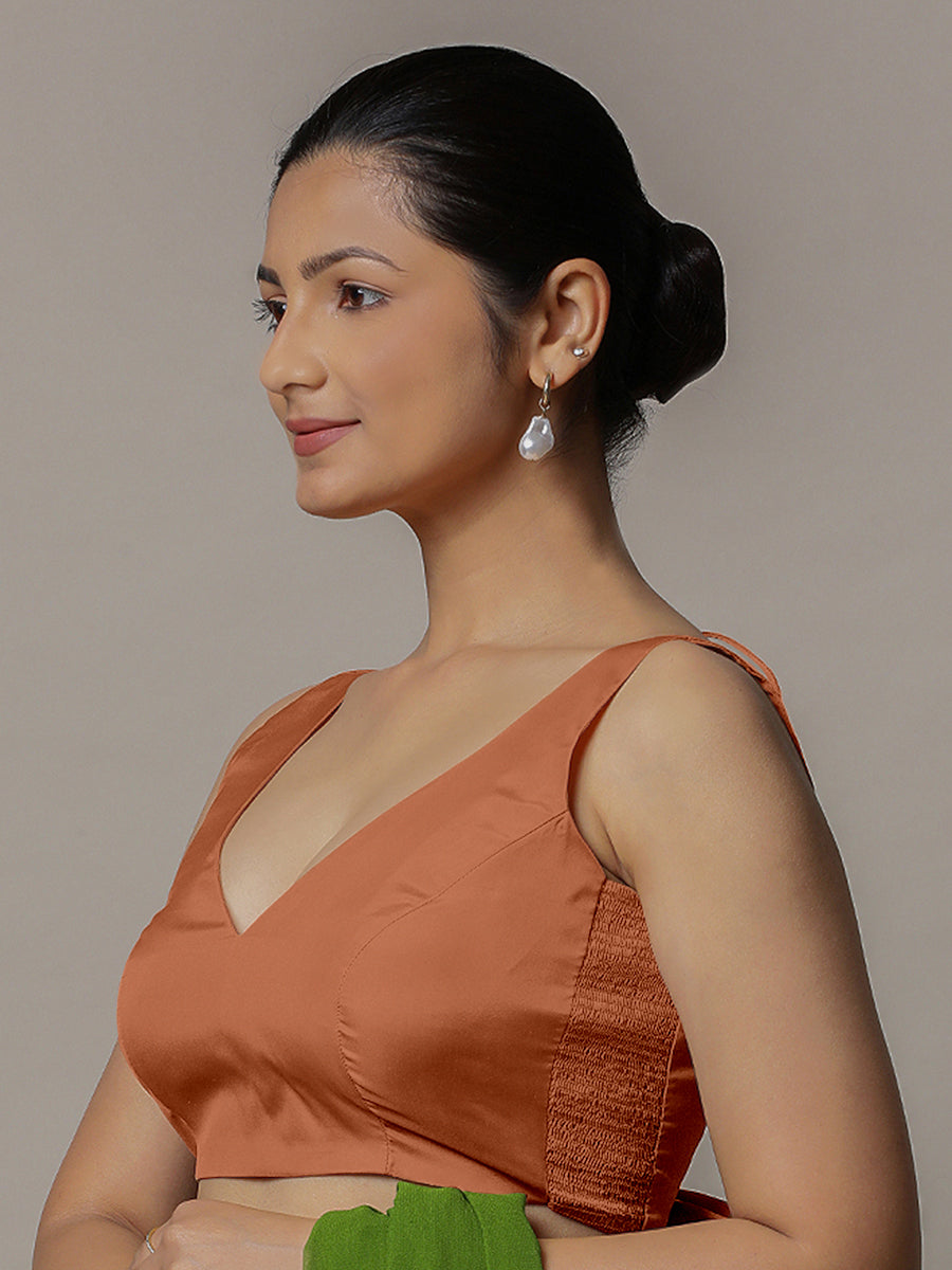 Raisa x Rozaana Saree Blouse, in Copper Vegan Silk, featuring sleeveless and curved v-neckline, made for party & festive.