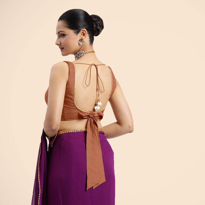 Raisa x Tyohaar | Metallic Copper Sleeveless FlexiFit™ Saree Blouse with V Neckline with Golden Gota Lace Embellishment and Back Cut-out with Tie-Up-Binks