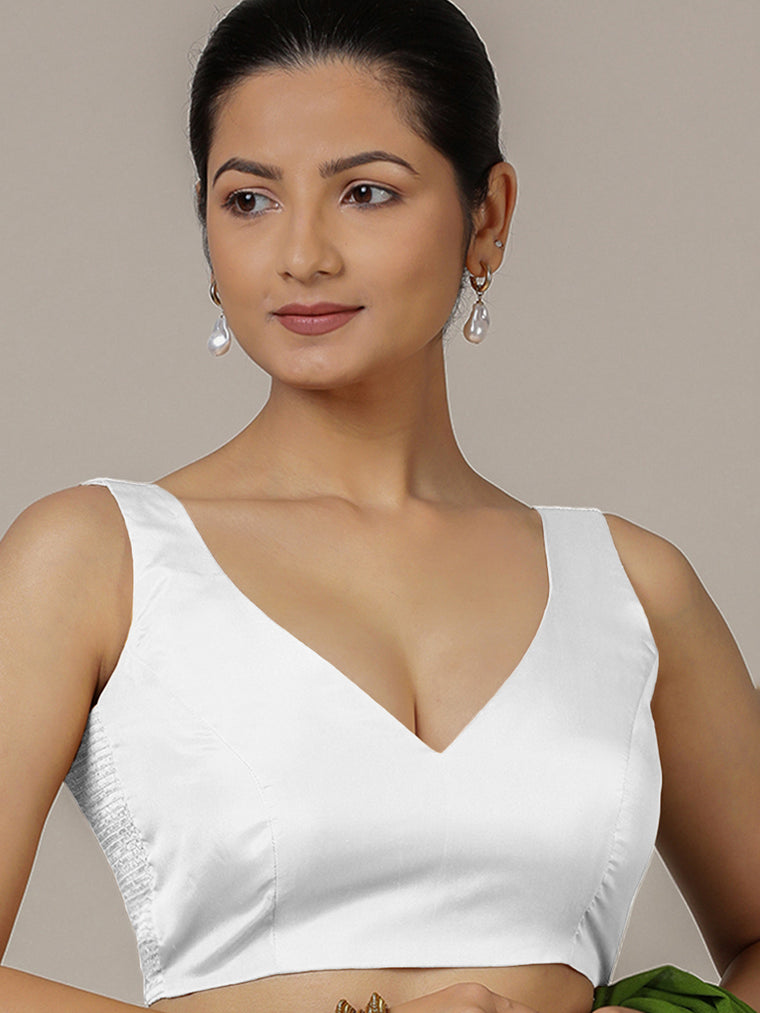 Raisa x Rozaana Saree Blouse, in White Vegan Silk, featuring sleeveless and curved v-neckline, made for party & festive.