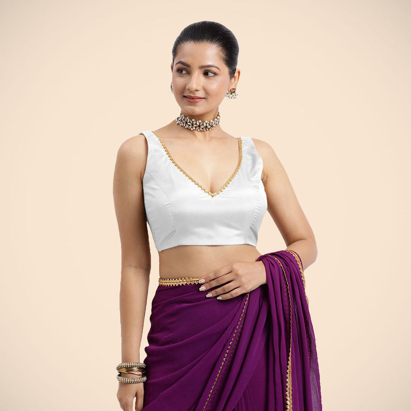 Raisa x Tyohaar | Pearl White Sleeveless FlexiFit™ Saree Blouse with V Neckline with Golden Gota Lace Embellishment and Back Cut-out with Tie-Up-Binks