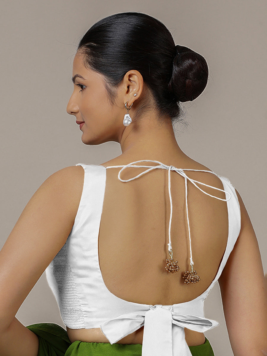 Raisa x Rozaana Saree Blouse, in White Vegan Silk, featuring sleeveless and curved v-neckline, made for party & festive.