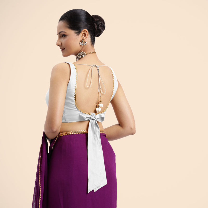 Raisa x Tyohaar | Pearl White Sleeveless FlexiFit™ Saree Blouse with V Neckline with Golden Gota Lace Embellishment and Back Cut-out with Tie-Up-Binks