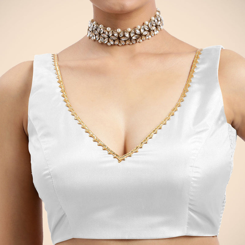 Raisa x Tyohaar | Pearl White Sleeveless FlexiFit™ Saree Blouse with V Neckline with Golden Gota Lace Embellishment and Back Cut-out with Tie-Up-Binks
