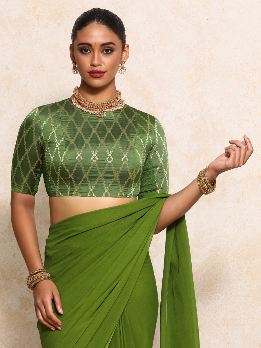 Reena x Tyohaar Saree Blouse, in Green Viscose Silk Brocade, featuring elbow sleeves and jewel neckline (view 5).