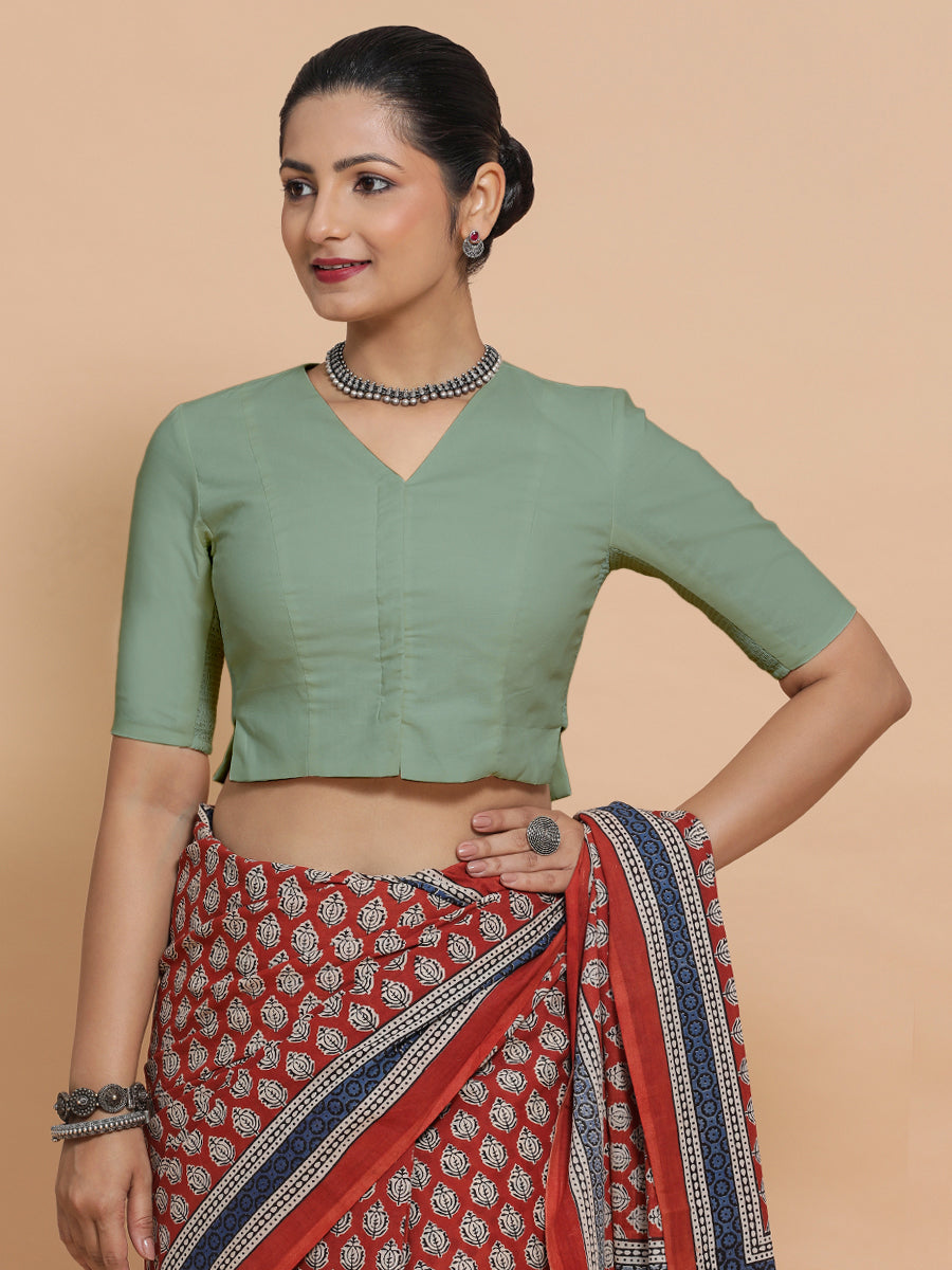 Rini x Rozaana Saree Blouse, in Green Linen, featuring elbow sleeves and v-neckline, made for daily & work.