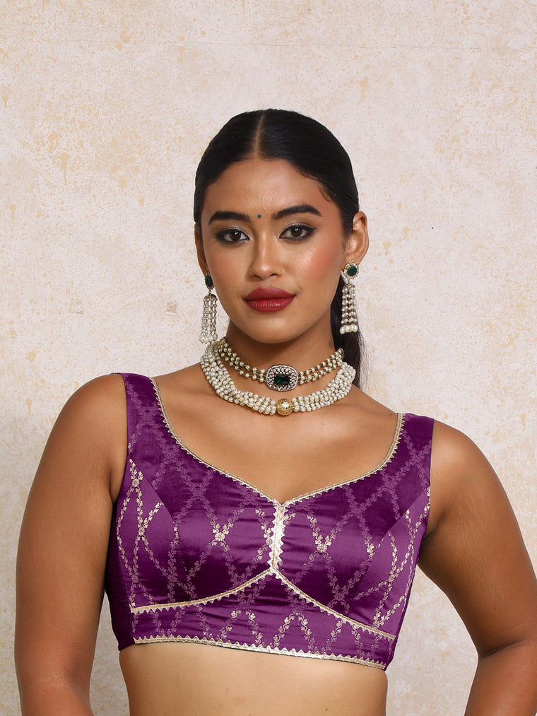Rivana x Tyohaar Saree Blouse, in Purple Viscose Silk Brocade, featuring sleeveless and sweetheart neckline.