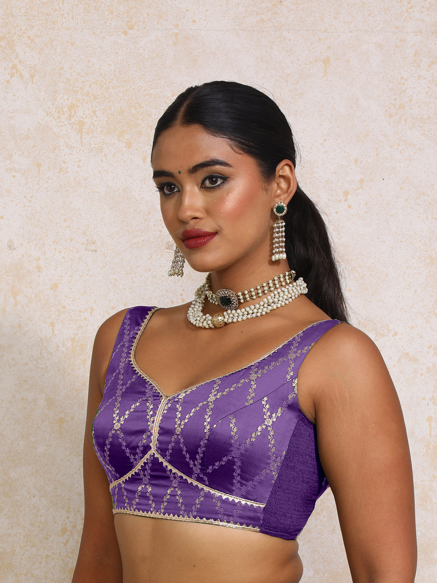 Rivana x Tyohaar Saree Blouse, in Purple Viscose Silk Brocade, featuring sleeveless and sweetheart neckline.