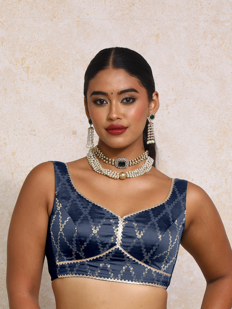 Rivana x Tyohaar Saree Blouse, in Blue Viscose Silk Brocade, featuring sleeveless and sweetheart neckline.