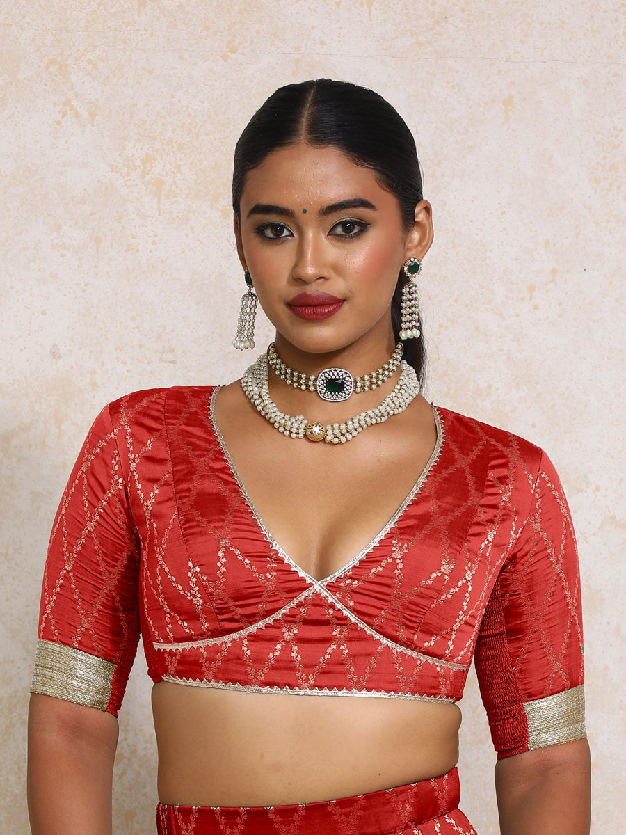 Rivya x Tyohaar Saree Blouse, in Red Viscose Silk Brocade, featuring elbow sleeves and v-neckline, made for party & festive.