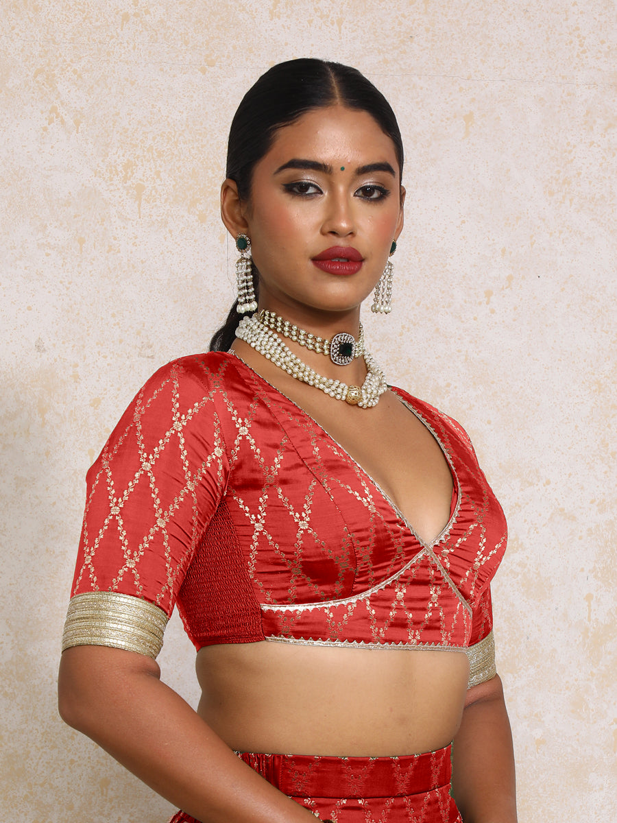 Rivya x Tyohaar Saree Blouse, in Red Viscose Silk Brocade, featuring elbow sleeves and v-neckline, made for party & festive.