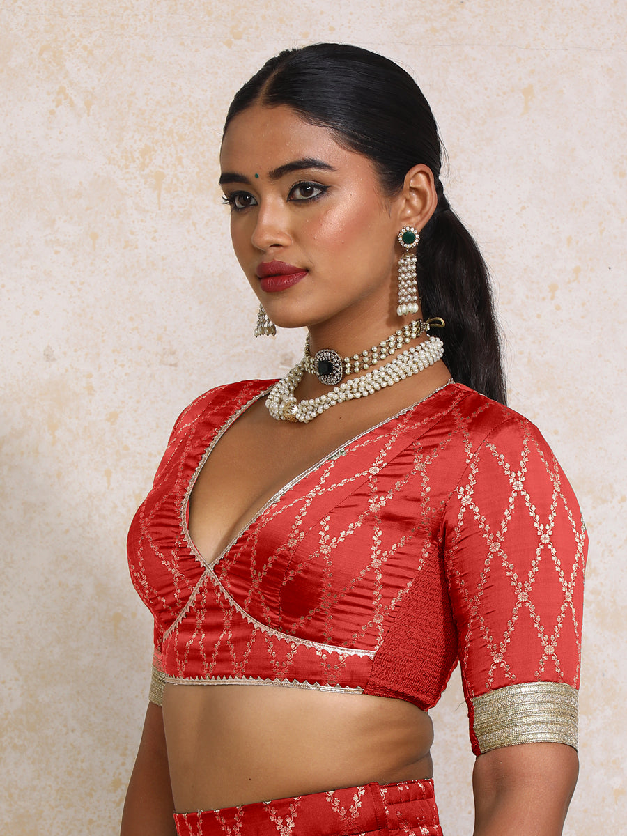 Rivya x Tyohaar Saree Blouse, in Red Viscose Silk Brocade, featuring elbow sleeves and v-neckline, made for party & festive.