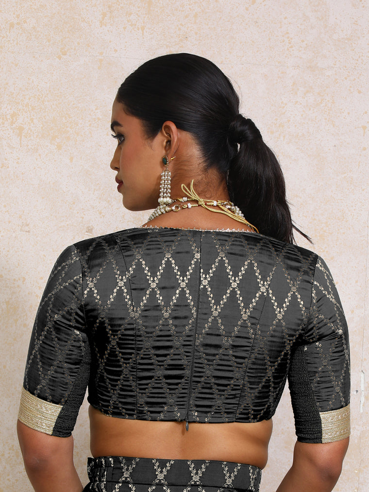 Rivya x Tyohaar Saree Blouse, in Black Viscose Silk Brocade, featuring elbow sleeves and v-neckline (view 2).
