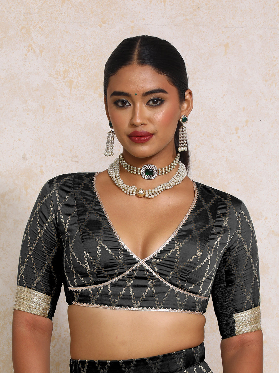 Rivya x Tyohaar Saree Blouse, in Black Viscose Silk Brocade, featuring elbow sleeves and v-neckline (view 6).