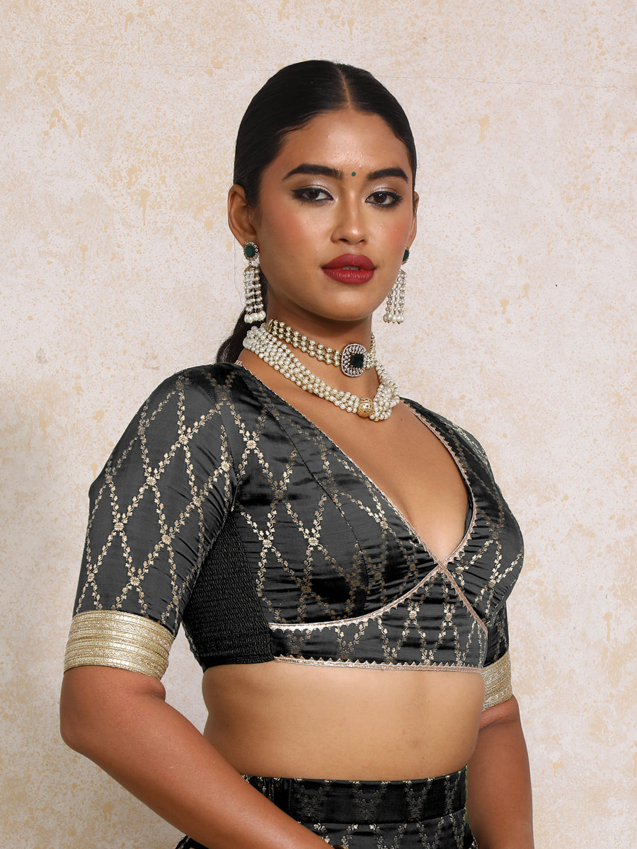 Rivya x Tyohaar Saree Blouse, in Black Viscose Silk Brocade, featuring elbow sleeves and v-neckline (view 7).