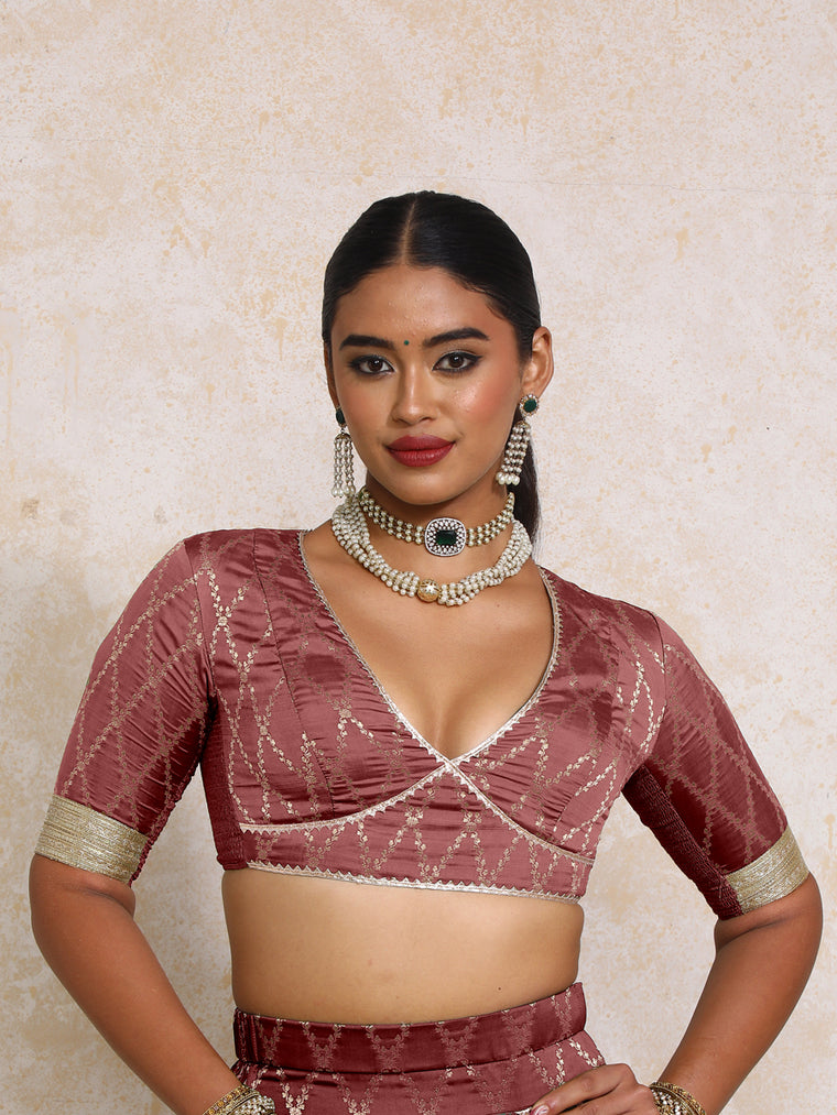Rivya x Tyohaar Saree Blouse, in Maroon Viscose Silk Brocade, featuring elbow sleeves and v-neckline.
