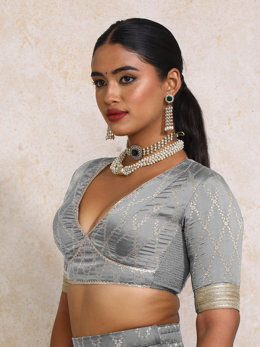 Rivya x Tyohaar Saree Blouse, in Grey Viscose Silk Brocade, featuring elbow sleeves and v-neckline, made for party & festive.