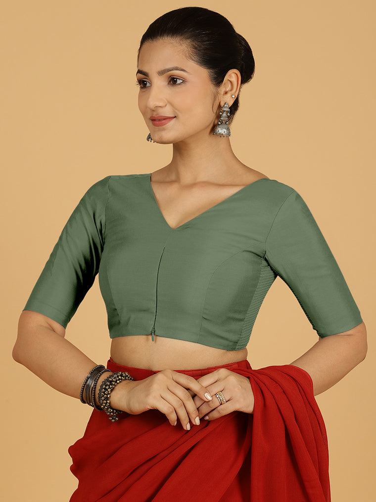 Shabana x Rozaana Saree Blouse, in Green Viscose, featuring elbow sleeves and curved v-neckline, made for daily & work.