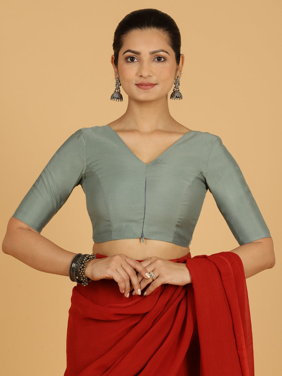 Shabana x Rozaana Saree Blouse, in Green Viscose, featuring elbow sleeves and curved v-neckline, made for daily & work.