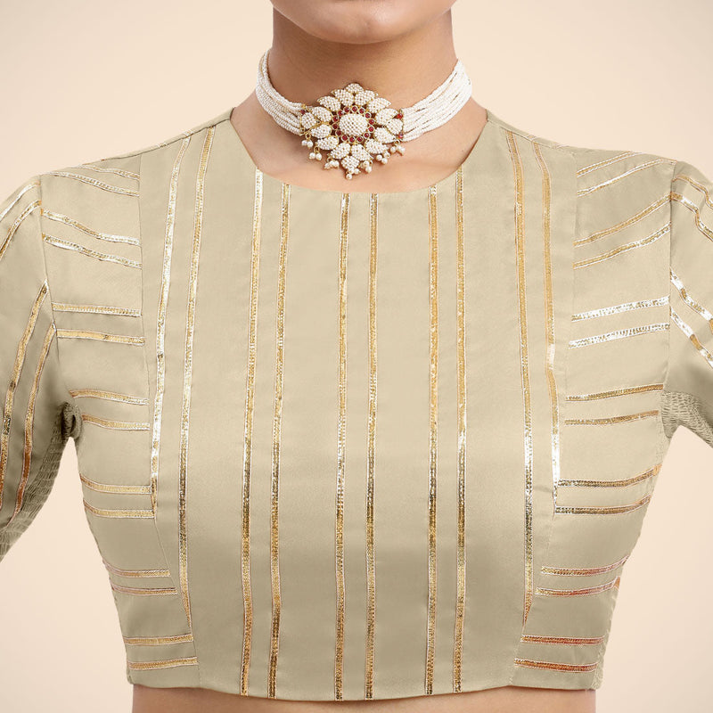 Shaheen x Tyohaar | Cream Elbow Sleeves FlexiFit™ Saree Blouse with Zero Neck with Back Cut-Out and Golden Gota Embellishment-Binks