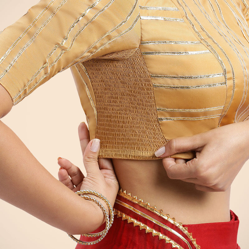 Shaheen x Tyohaar | Gold Elbow Sleeves FlexiFit™ Saree Blouse with Zero Neck with Back Cut-Out and Golden Gota Embellishment-Binks