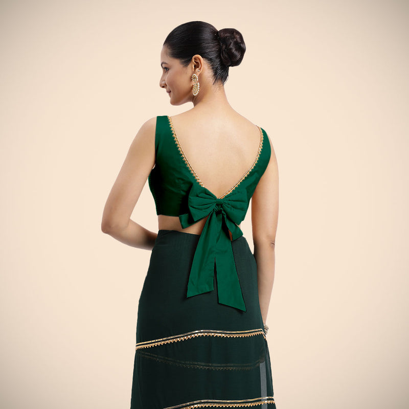 Sherry x Tyohaar | Bottle Green Sleeveless FlexiFit™ Saree Blouse with Simple Golden Gota Lace on Neckline and Removable Bow on Back-Binks