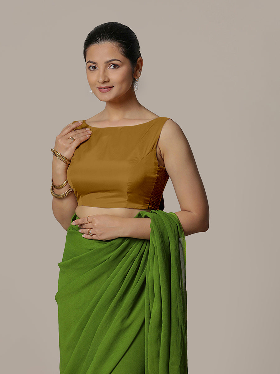Sherry x Rozaana Saree Blouse, in Gold Vegan Silk, featuring sleeveless and boat neckline, made for party & festive.