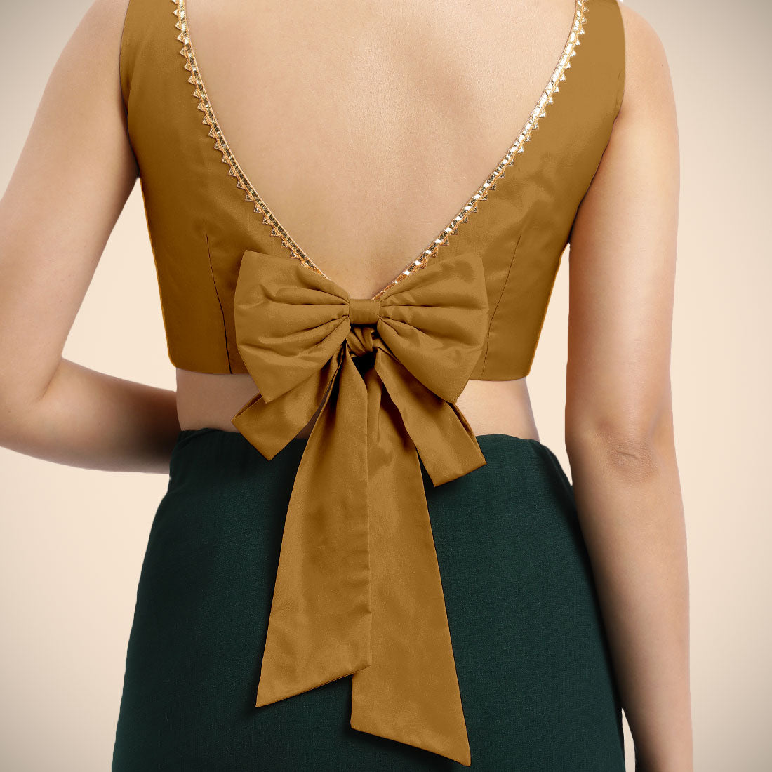 Sherry x Tyohaar Saree Blouse, in Gold Vegan Silk, featuring sleeveless and boat neckline, made for party & festive (view 4).