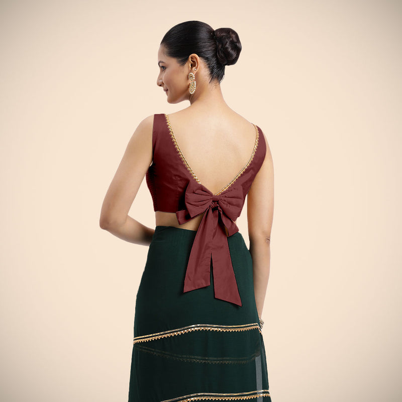 Sherry x Tyohaar | Burgundy Sleeveless FlexiFit™ Saree Blouse with Simple Golden Gota Lace on Neckline and Removable Bow on Back-Binks