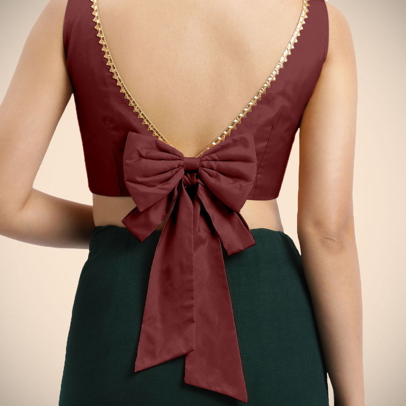 Sherry x Tyohaar | Burgundy Sleeveless FlexiFit™ Saree Blouse with Simple Golden Gota Lace on Neckline and Removable Bow on Back-Binks