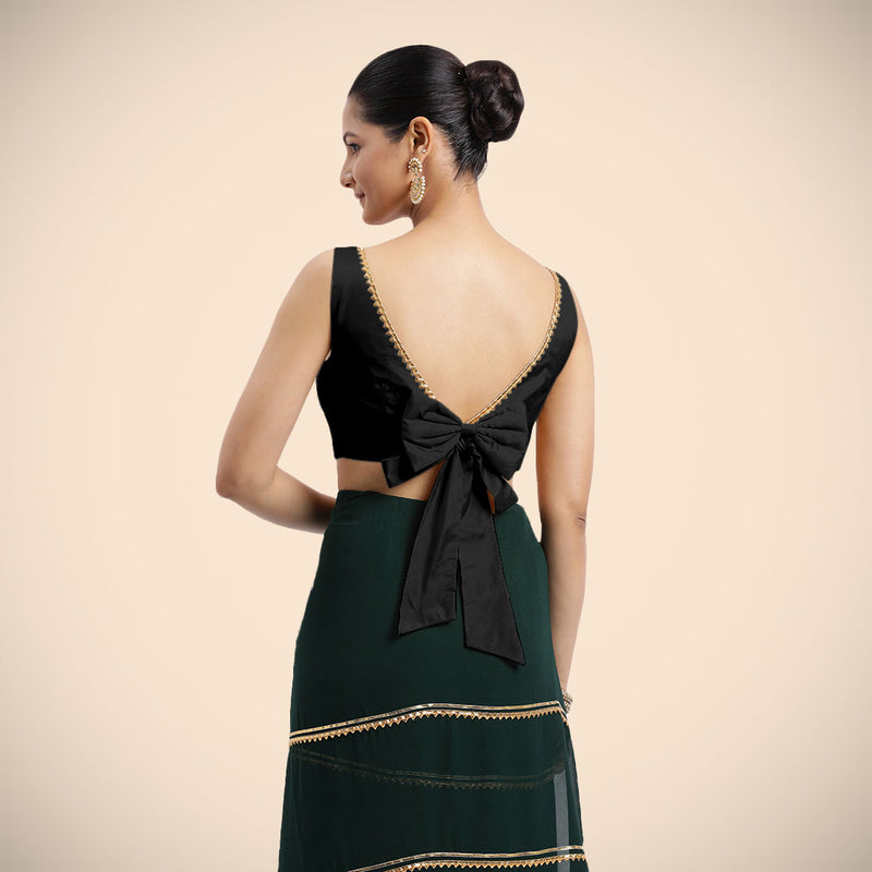 Sherry x Tyohaar | Charcoal Black Sleeveless FlexiFit™ Saree Blouse with Simple Golden Gota Lace on Neckline and Removable Bow on Back-Binks