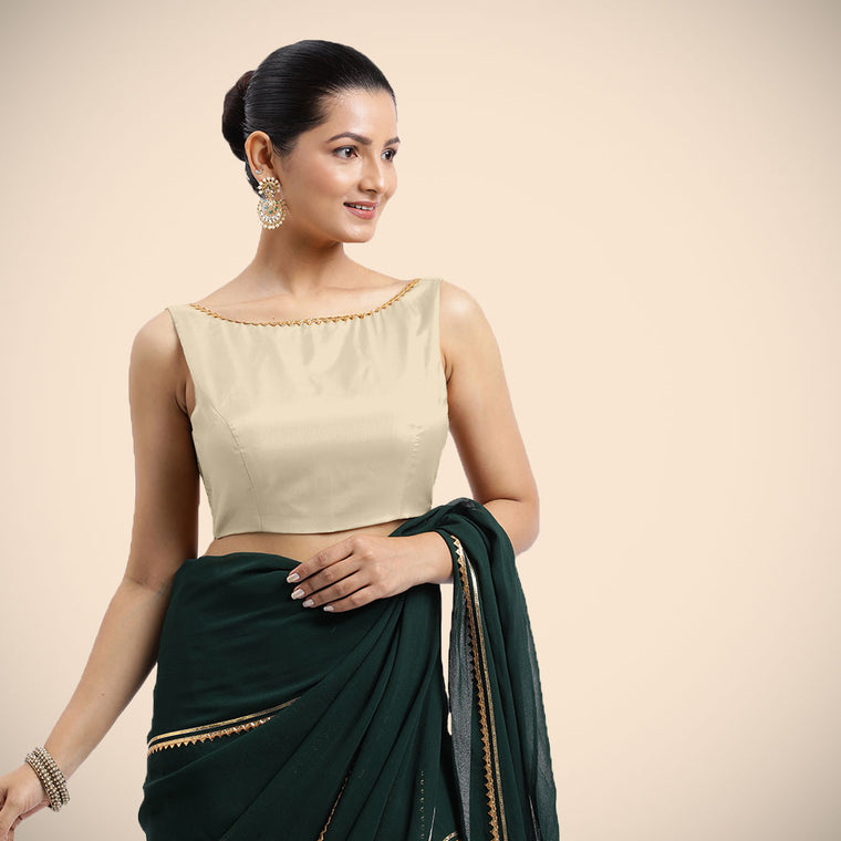 Sherry x Tyohaar Saree Blouse, in Cream Vegan Silk, featuring sleeveless and boat neckline, made for party & festive.