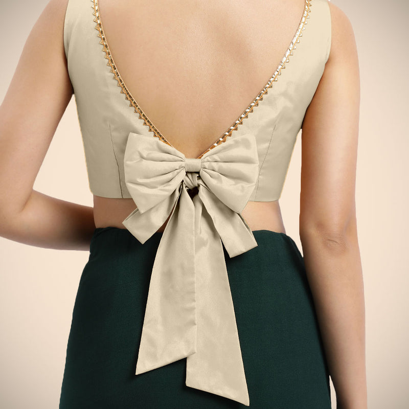 Sherry x Tyohaar | Cream Sleeveless FlexiFit™ Saree Blouse with Simple Golden Gota Lace on Neckline and Removable Bow on Back-Binks