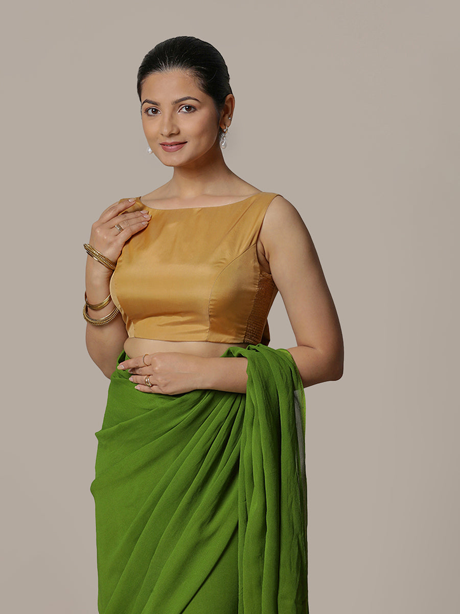 Sherry x Rozaana Saree Blouse, in Gold Vegan Silk, featuring sleeveless and boat neckline, made for party & festive.