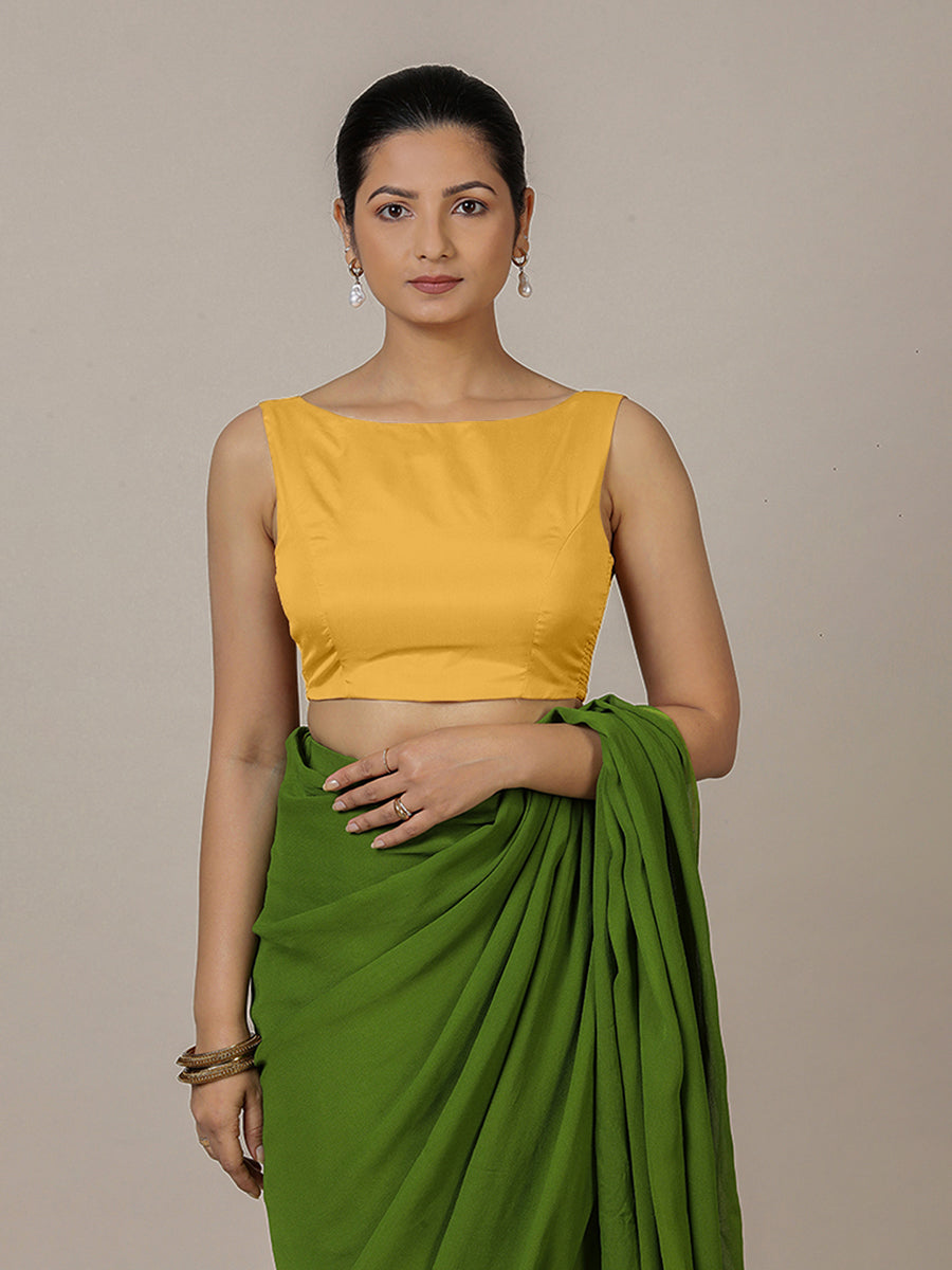 Sherry x Rozaana Saree Blouse, in Yellow Artificial Silk, featuring sleeveless and boat neckline, made for party & festive.