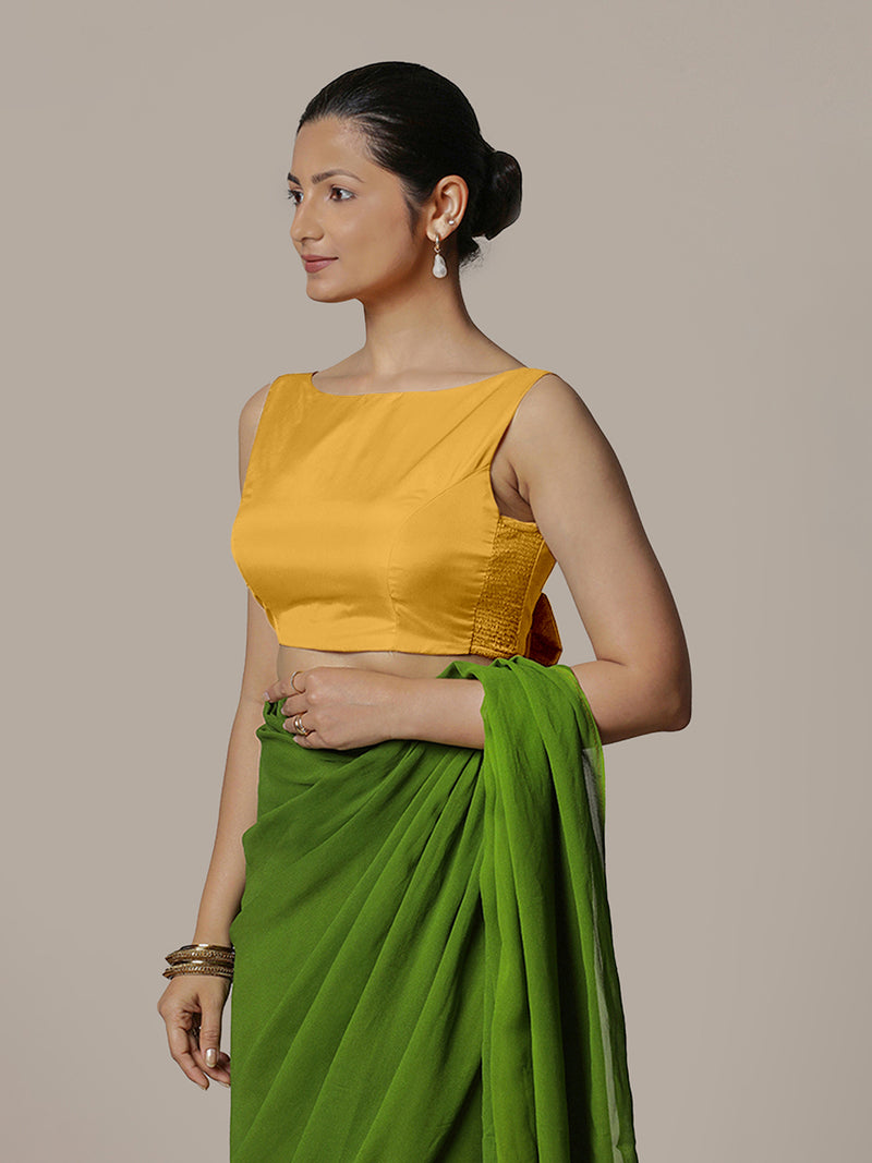 Sherry x Rozaana | Sleeveless Marigold Yellow FlexiFit™ Saree Blouse with Boat Neck-Binks