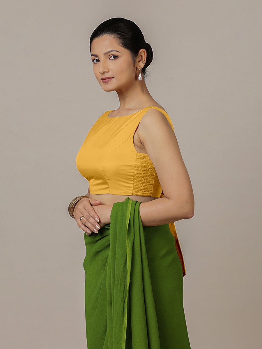 Sherry x Rozaana Saree Blouse, in Yellow Artificial Silk, featuring sleeveless and boat neckline, made for party & festive.