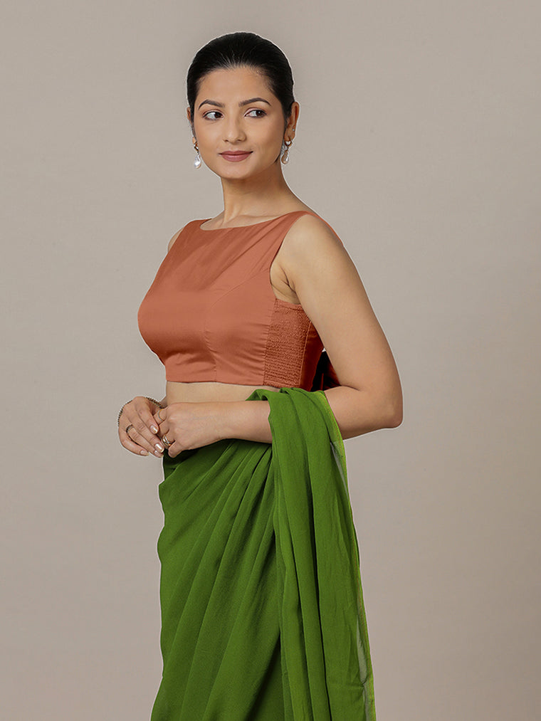 Sherry x Rozaana Saree Blouse, in Copper Vegan Silk, featuring sleeveless and boat neckline, made for party & festive.