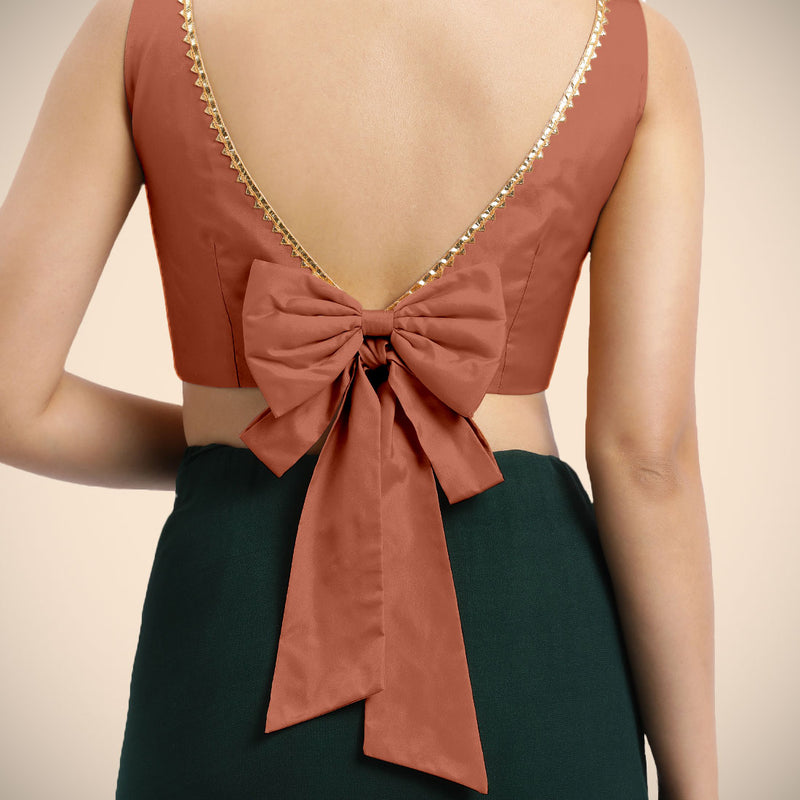 Sherry x Tyohaar | Metallic Copper Sleeveless FlexiFit™ Saree Blouse with Simple Golden Gota Lace on Neckline and Removable Bow on Back-Binks