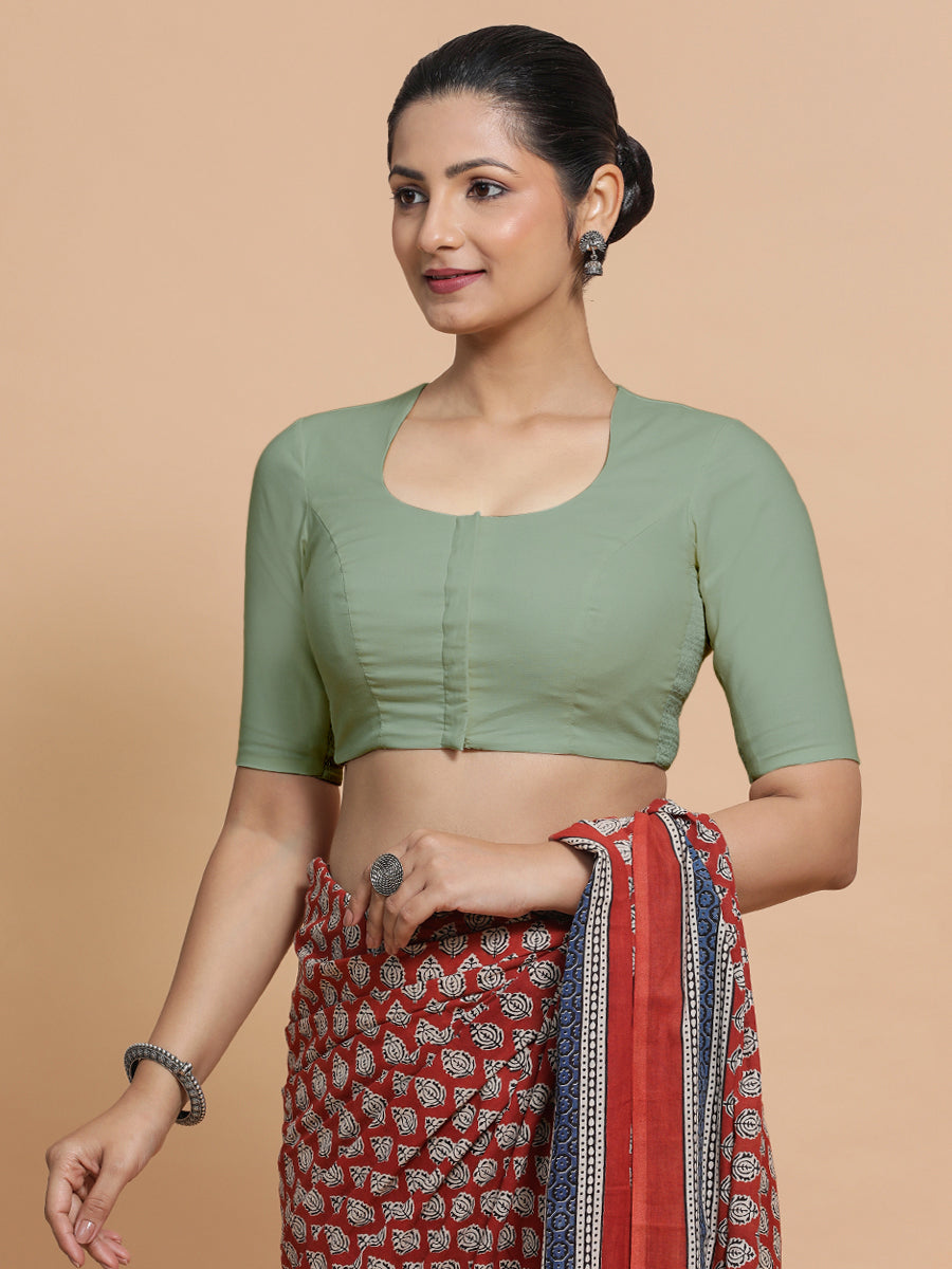 Shifa x Rozaana Saree Blouse, in Green Linen, featuring elbow sleeves and pot neckline, made for daily & work (view 6).