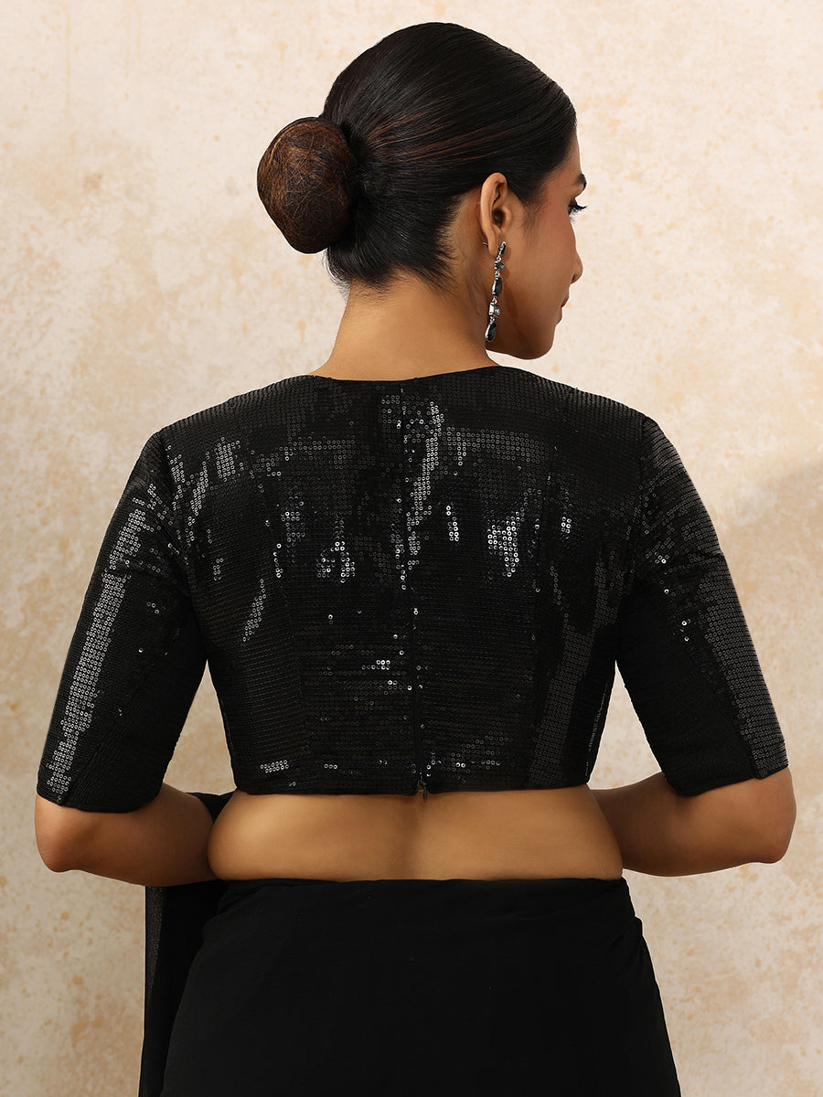 Shireen x Tyohaar Saree Blouse, in Black Sequin Fabric, featuring elbow sleeves and v-neckline, made for party & festive.