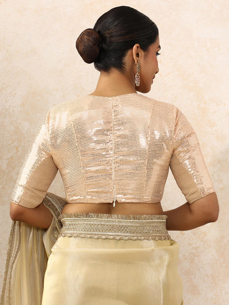 Shireen x Tyohaar Saree Blouse, in Cream Sequin Fabric, featuring elbow sleeves and v-neckline, made for party & festive.
