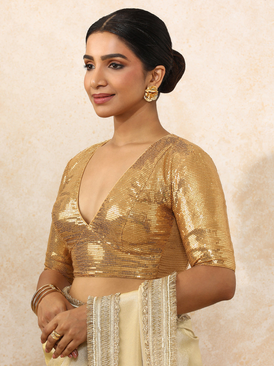 Shireen x Tyohaar Saree Blouse, in Gold Sequin Fabric, featuring elbow sleeves and v-neckline, made for party & festive.