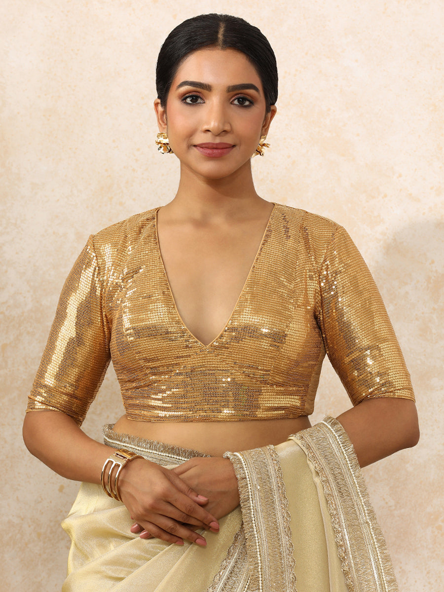 Shireen x Tyohaar Saree Blouse, in Gold Sequin Fabric, featuring elbow sleeves and v-neckline, made for party & festive.