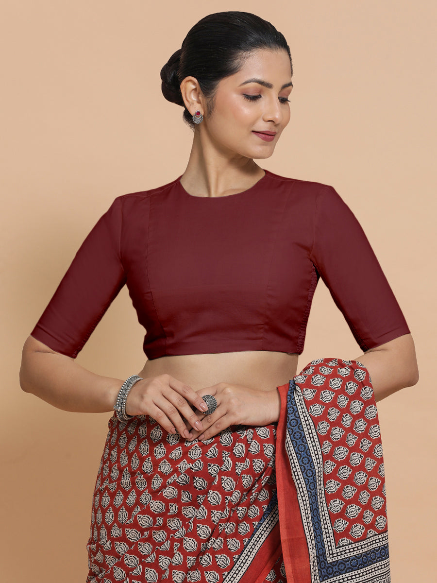 Suhana x Rozaana Saree Blouse, in Maroon Cotton, featuring elbow sleeves and jewel neckline, made for daily & work.