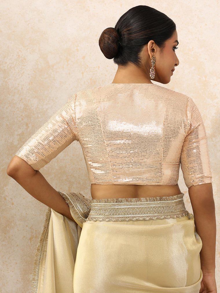 Sunidhi x Tyohaar Saree Blouse, in Cream Sequin Fabric, featuring elbow sleeves and v-neckline, made for party & festive.